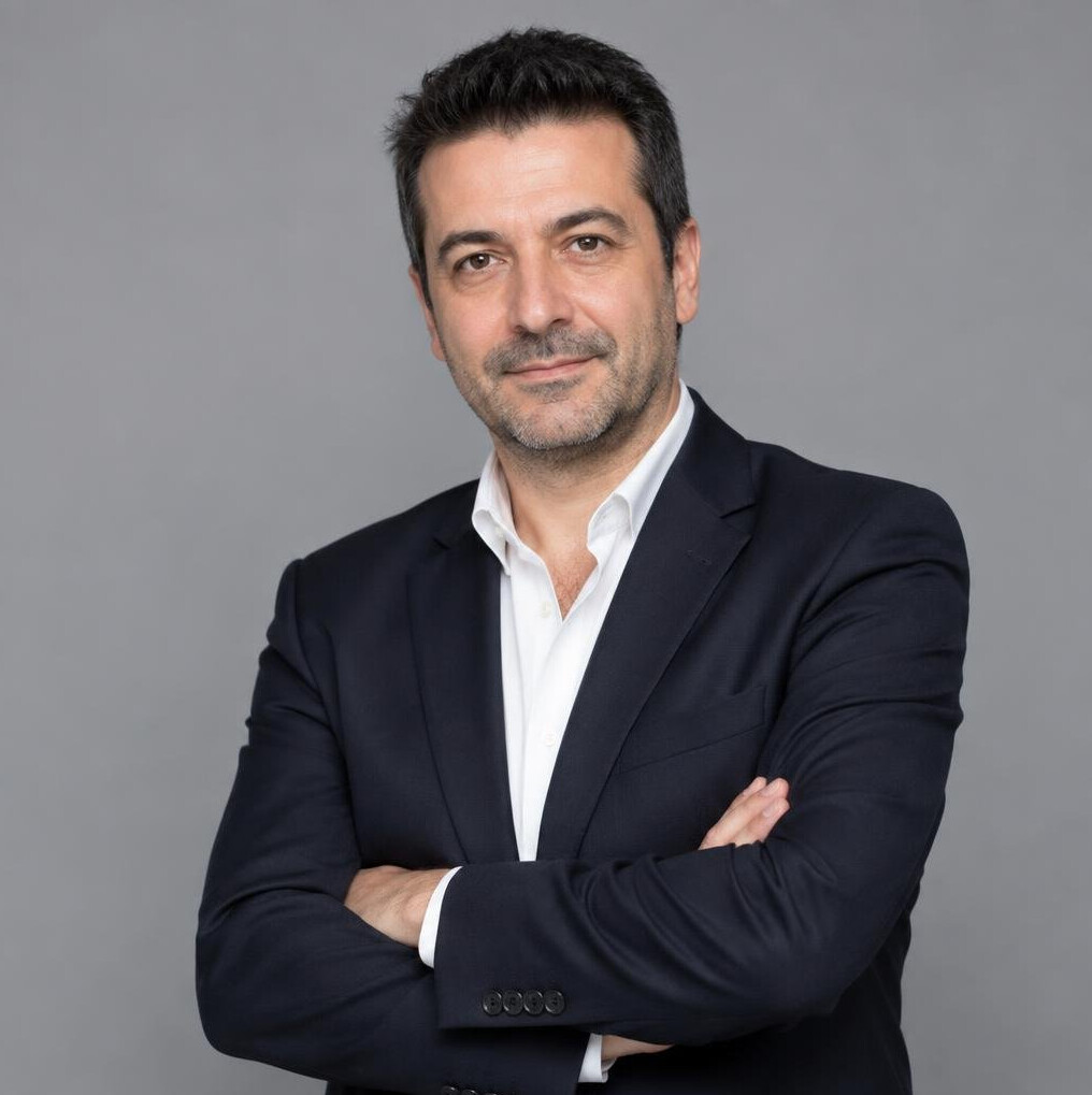 Man in suit portrait, broadcast producer